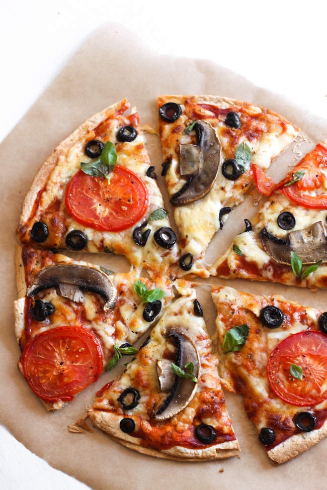Pizza quesadilla on brown papper.