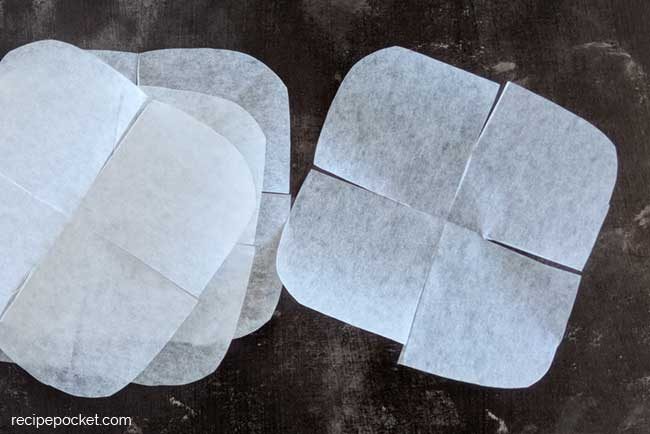 Parchment paper muffin liners, premade.