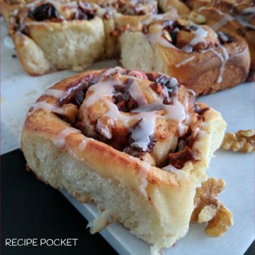 A closeup of an apple cinnamon roll.