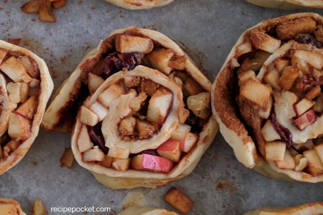 Close up of filling in the apple cinnamon rolls.