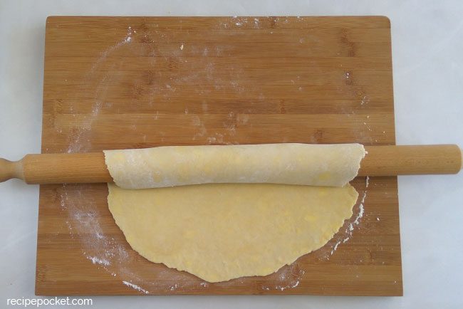 Image showing shortcrust pastry rolled on rolling pin.