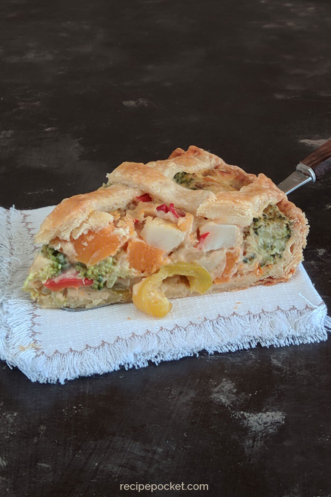 A slice of mixed vegetable pie