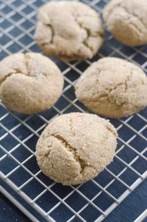 Closeup of five cookie on a wire rack.