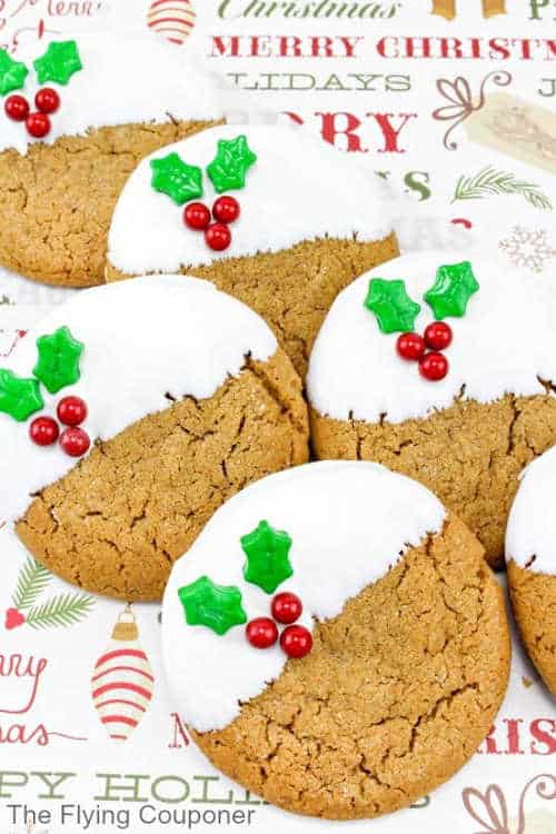 Gingerbread cookies dipped in white chocolate with red and green decorations.