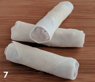 Rolled spring rolls, ready for deep frying.