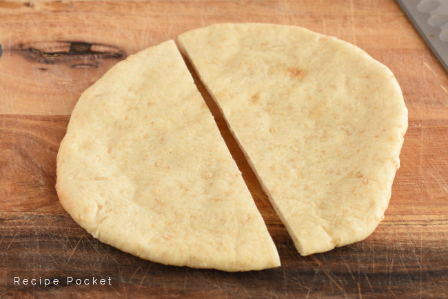 Image showing pita bread cut into half.