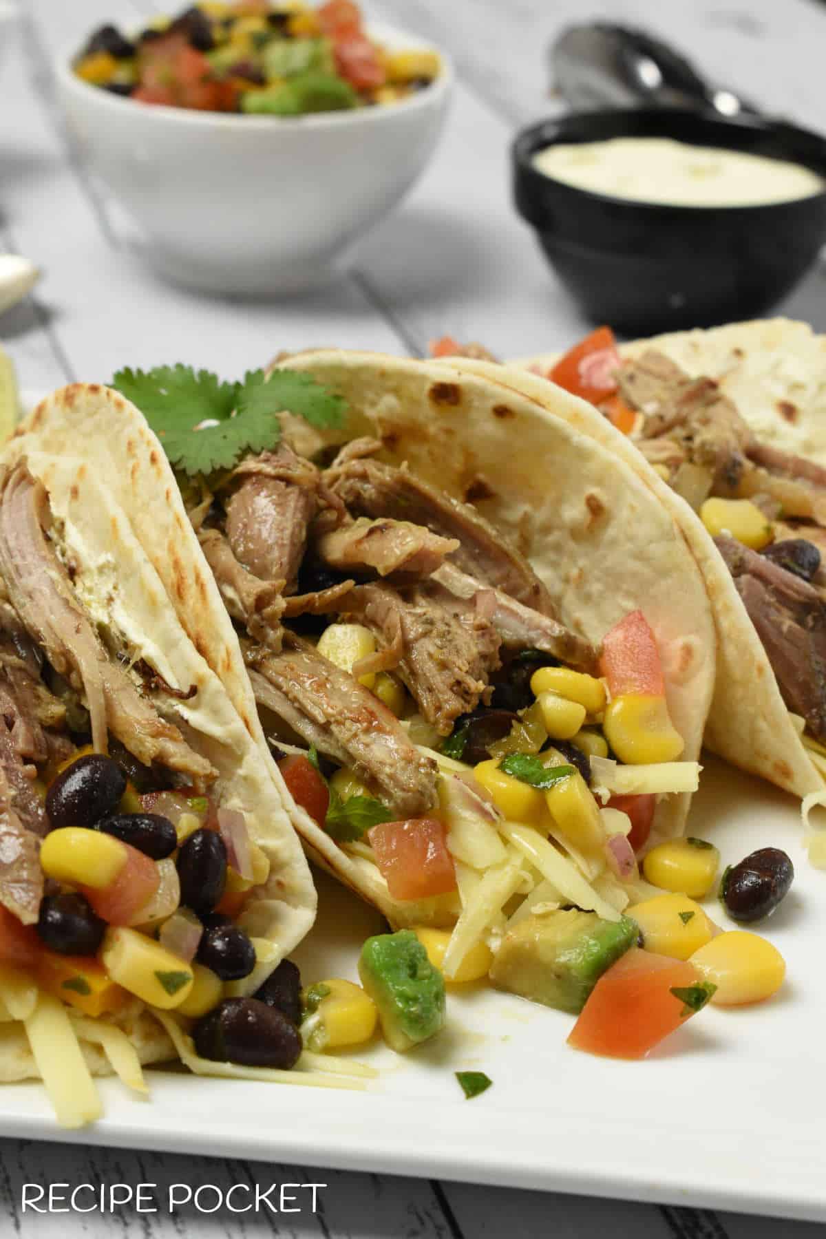 Pulled pork soft shell tacos.