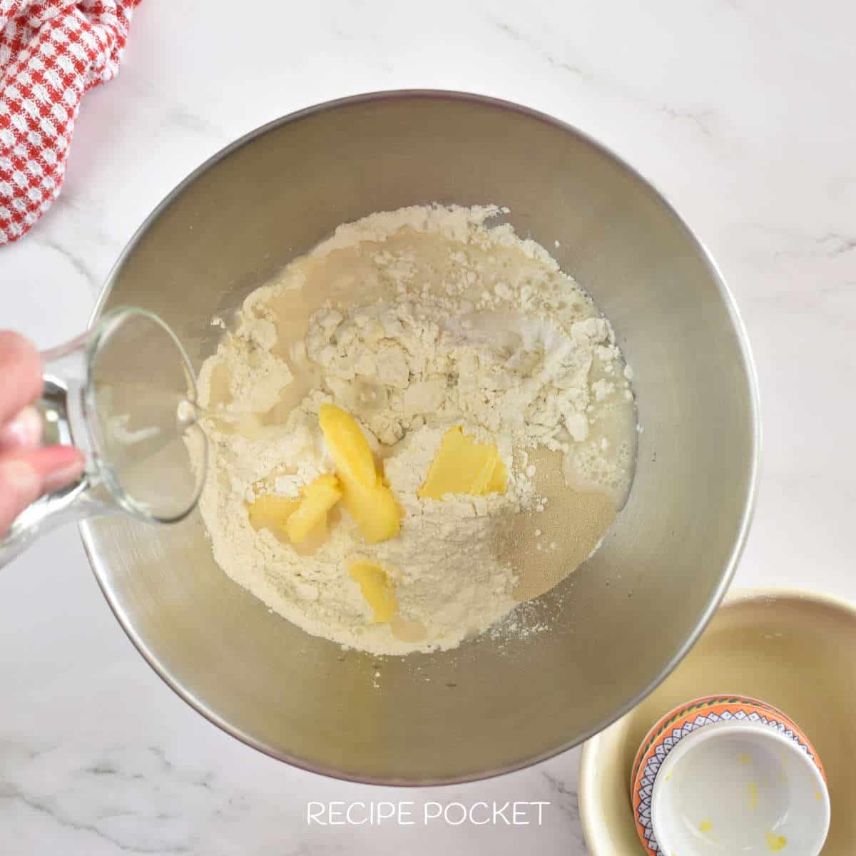 Ingredients for cob bread in a silver bowl.
