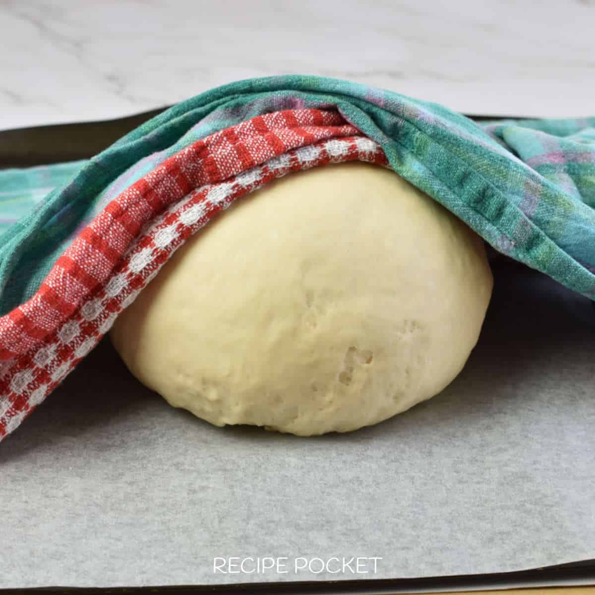 Dough under under cloths.