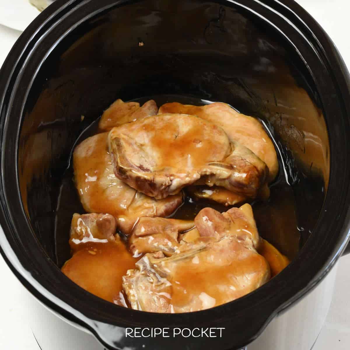 Pork chops in a slow cooker.