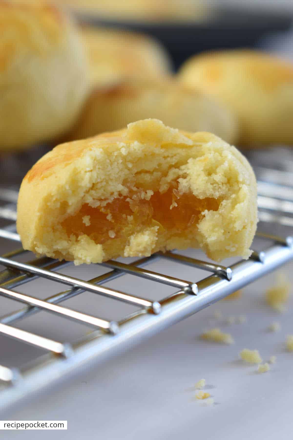 Image showing the jam filling inside a cooked pineapple tart.