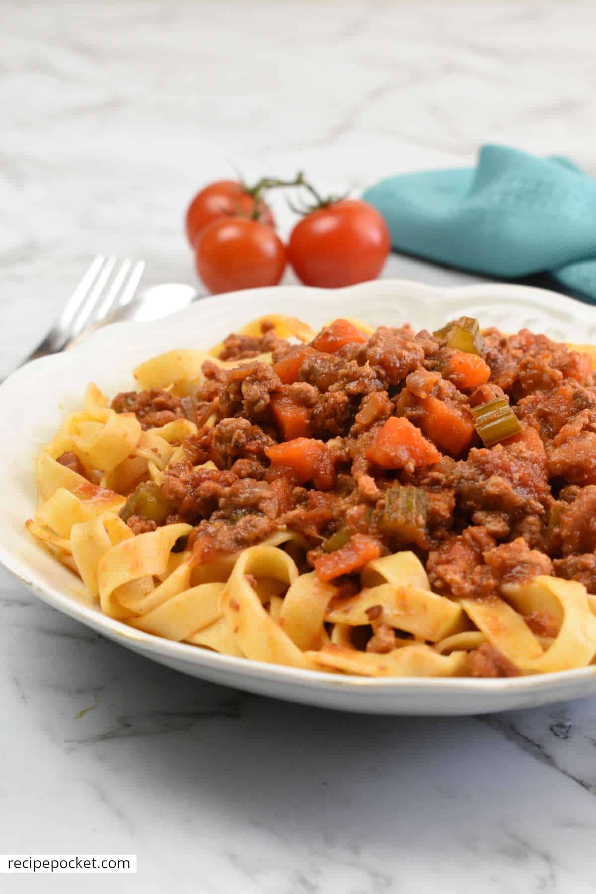 Beef and pork ragu on pasta.