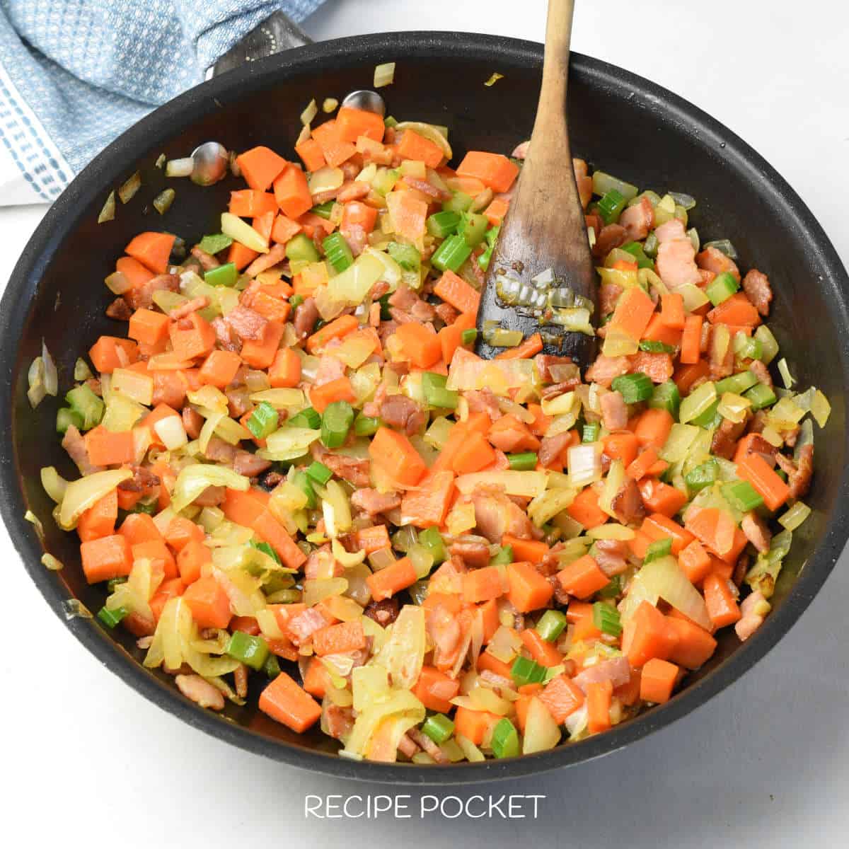 Sauteed vegetables in a skillet.