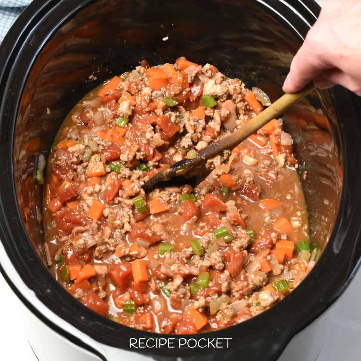 Pork ragu in slow cooker.