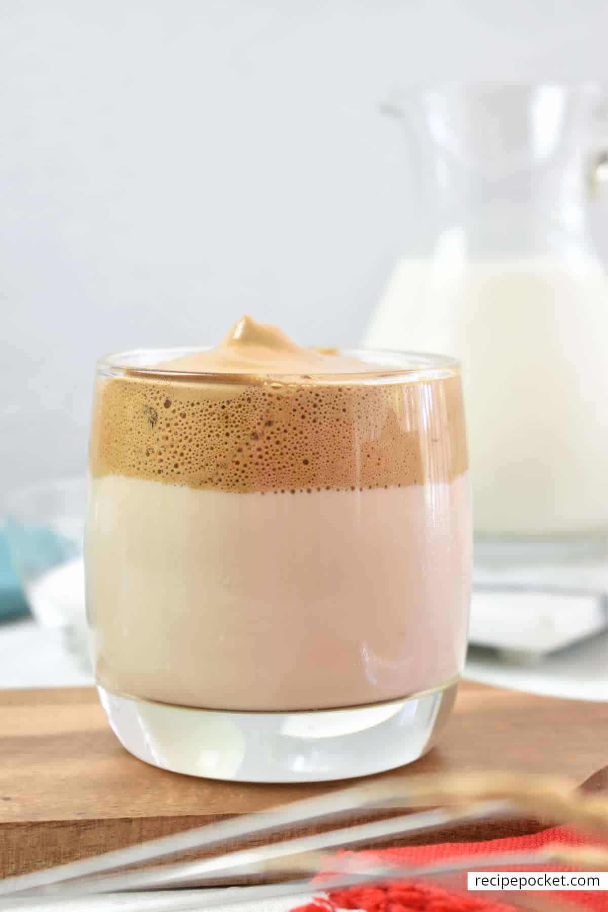 Closeup of a glass of dalgona coffee.