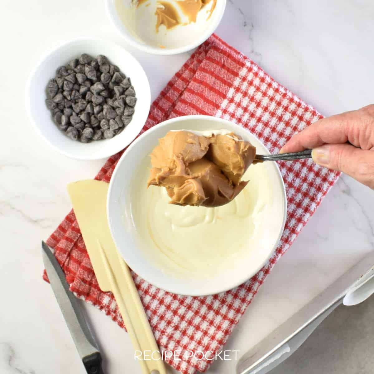 Peanut butter on a spoon.