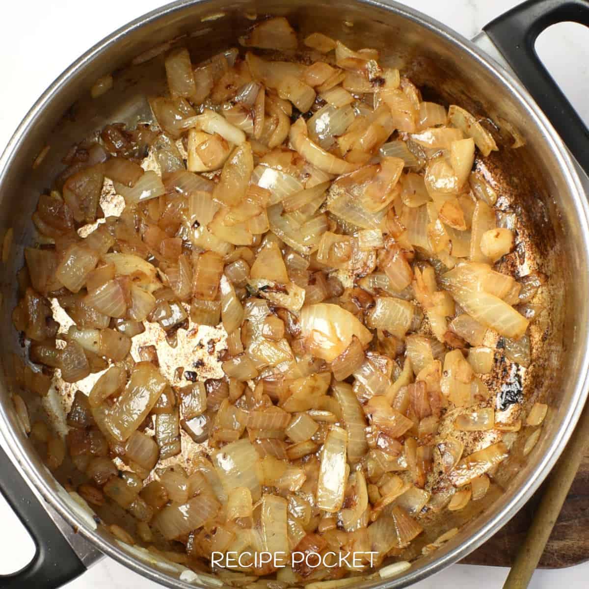 Fried onions in a pan.