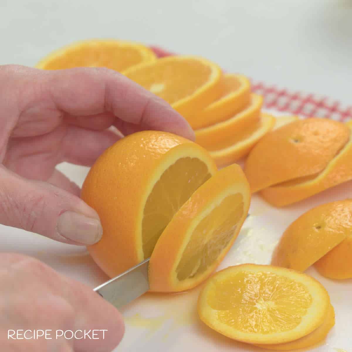 Ornages being sliced.