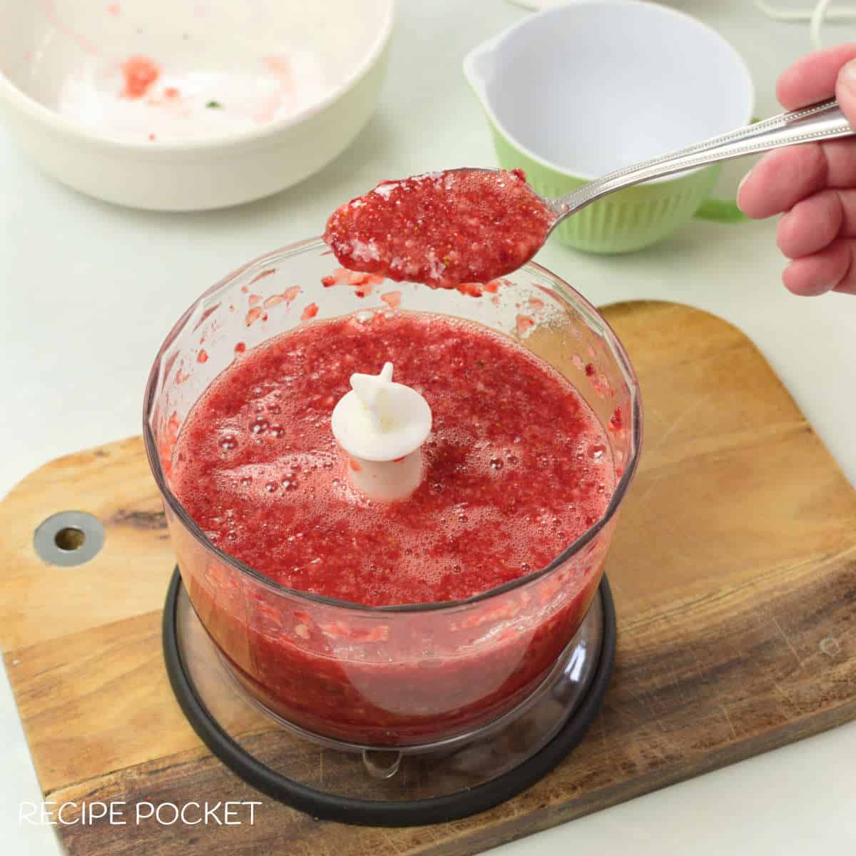 Strawberry puree in a blender.