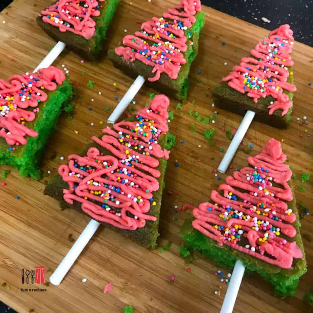 Mini Christmas tree cakes on sticks.