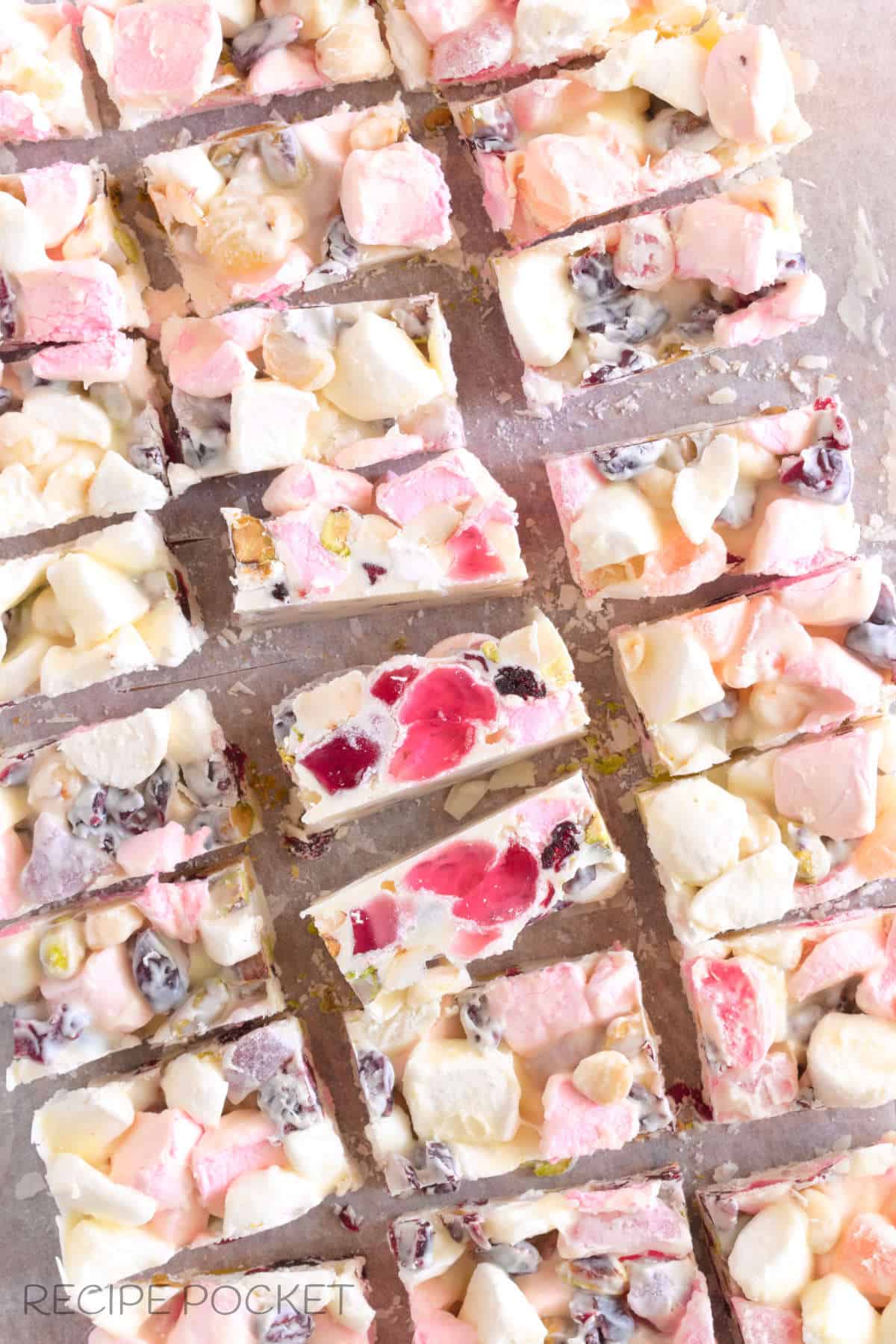 A cut slab of white rocky road.