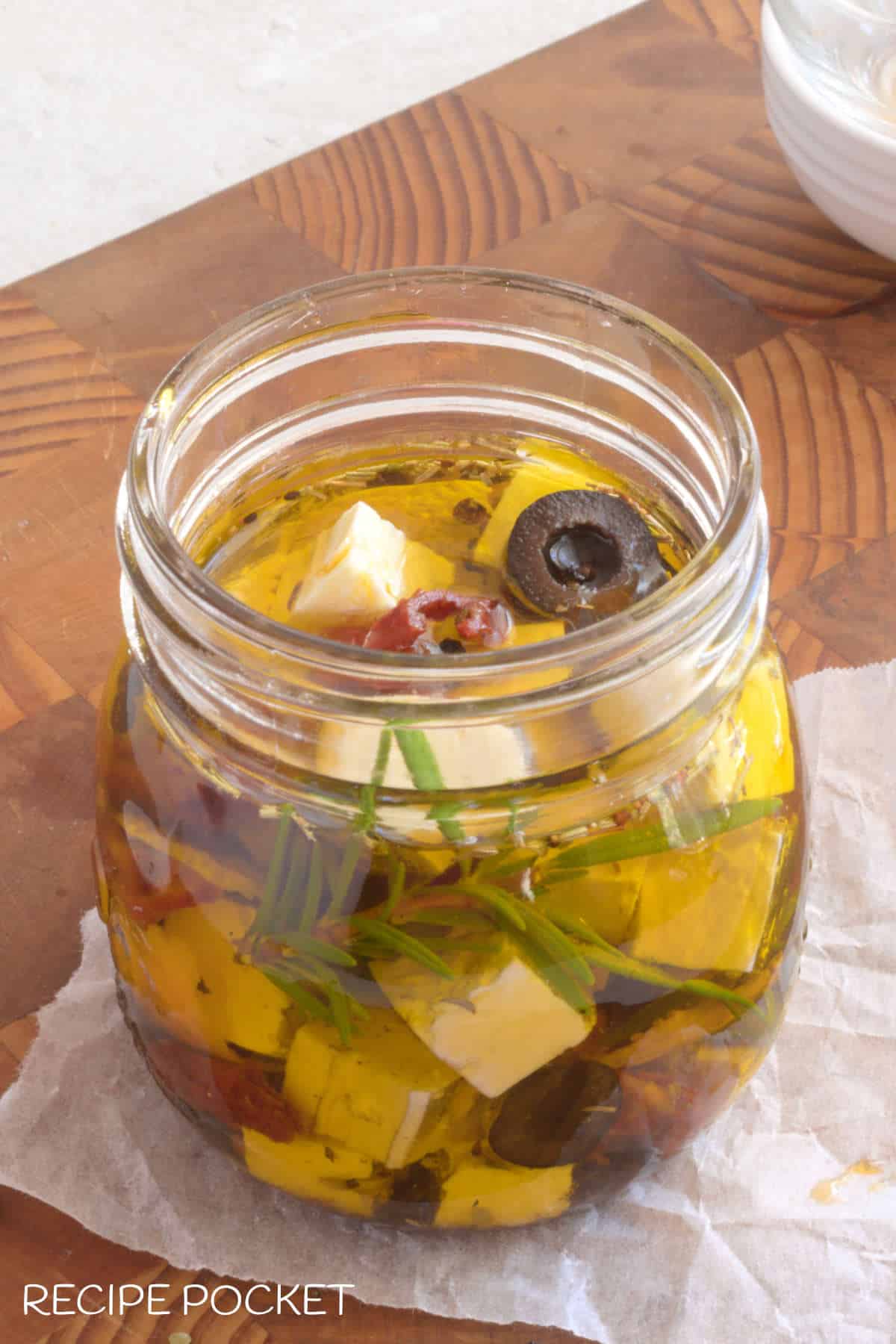 Closeup of feta in oil.