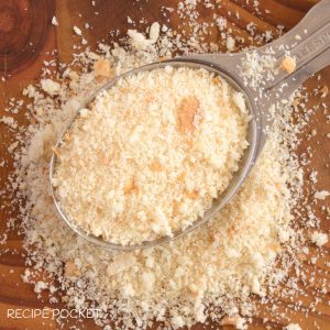 Top down image of homemade breadcrumbs in a spoon.