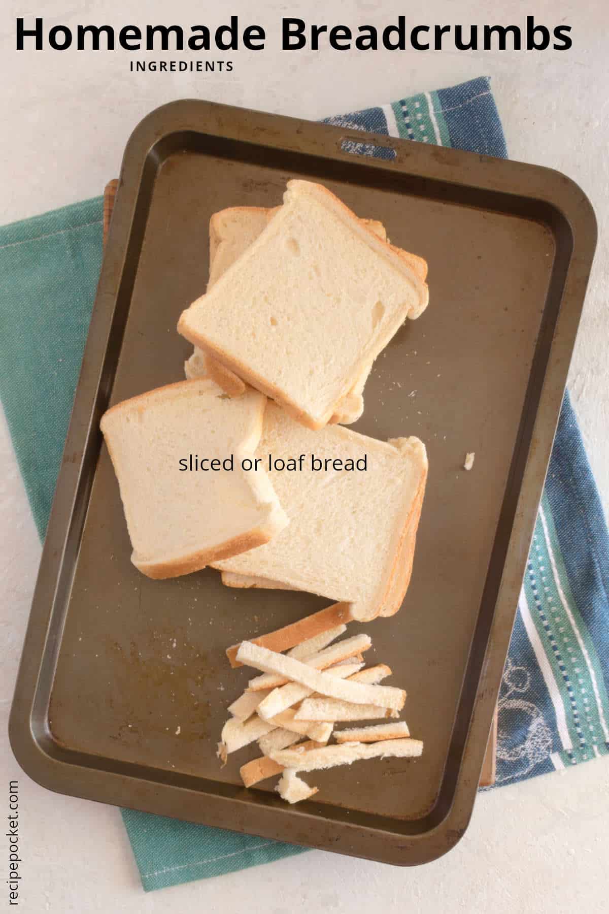Slices of white bread and bread crusts on a baking tray.