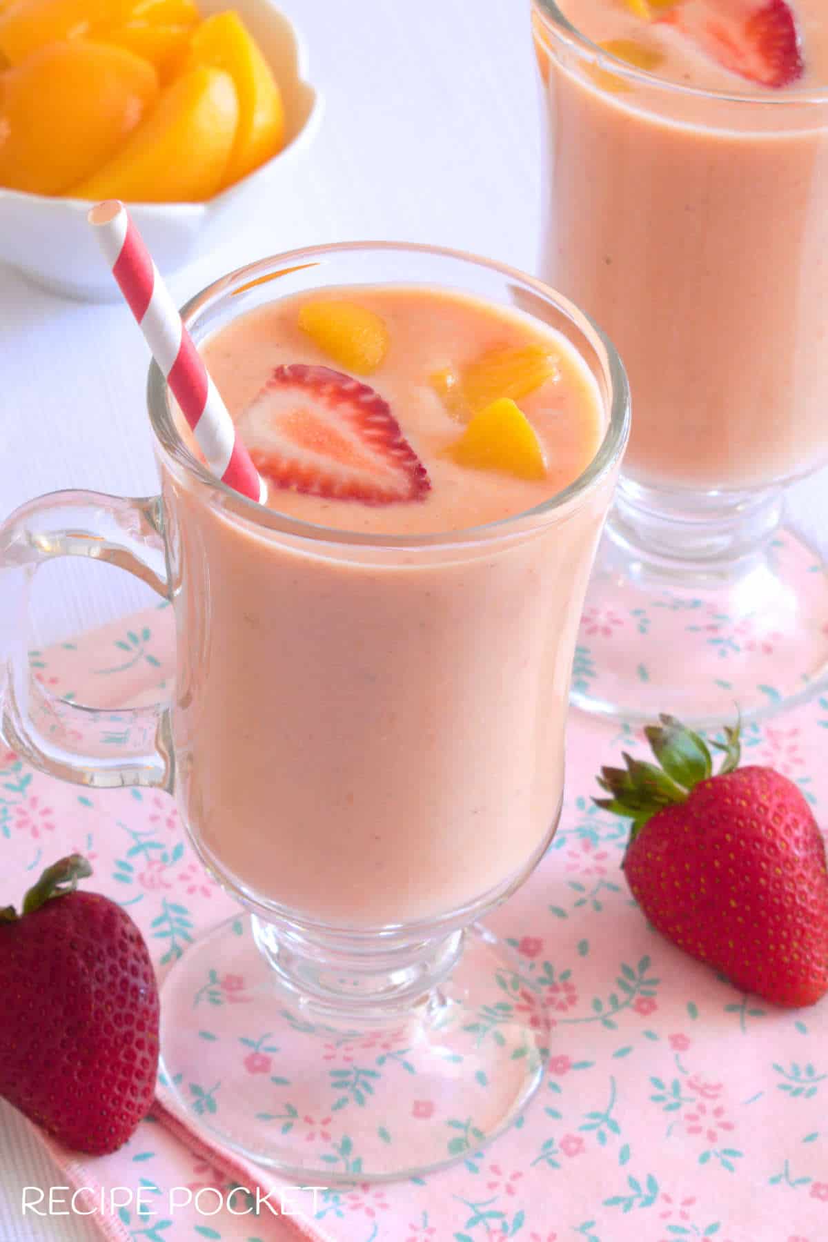 A fruit smoothie in a glass.