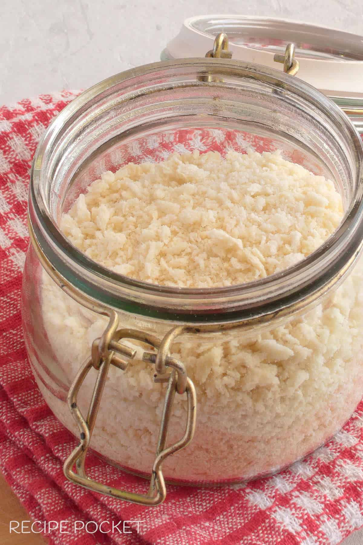 Homemade substitute for panko breadcrumbs in a clip top jar.