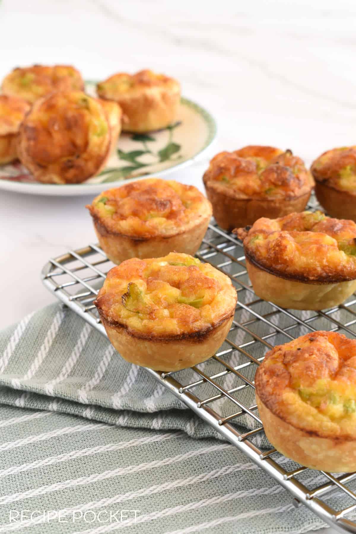 Bacon cheese quiche on silver rack.