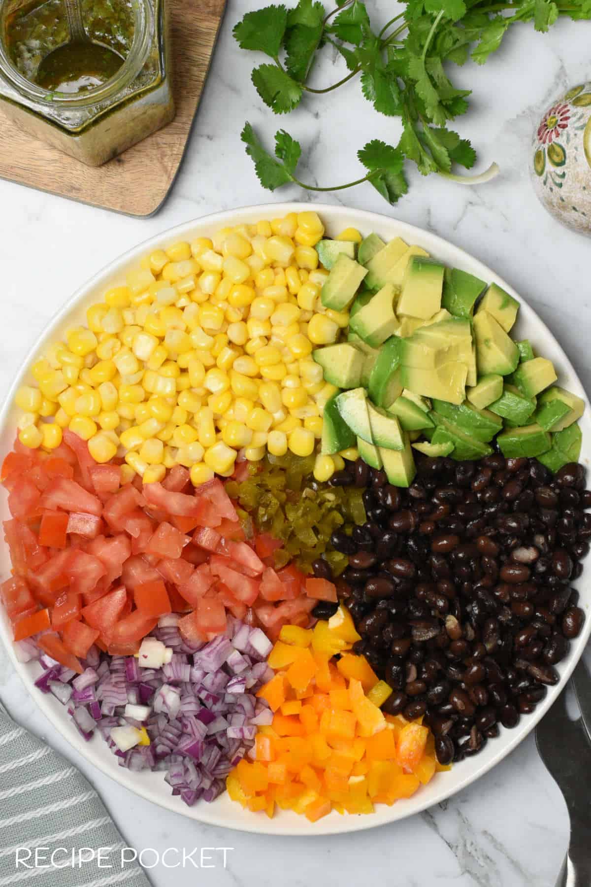 Unmixed salad ingredients on a bowl.