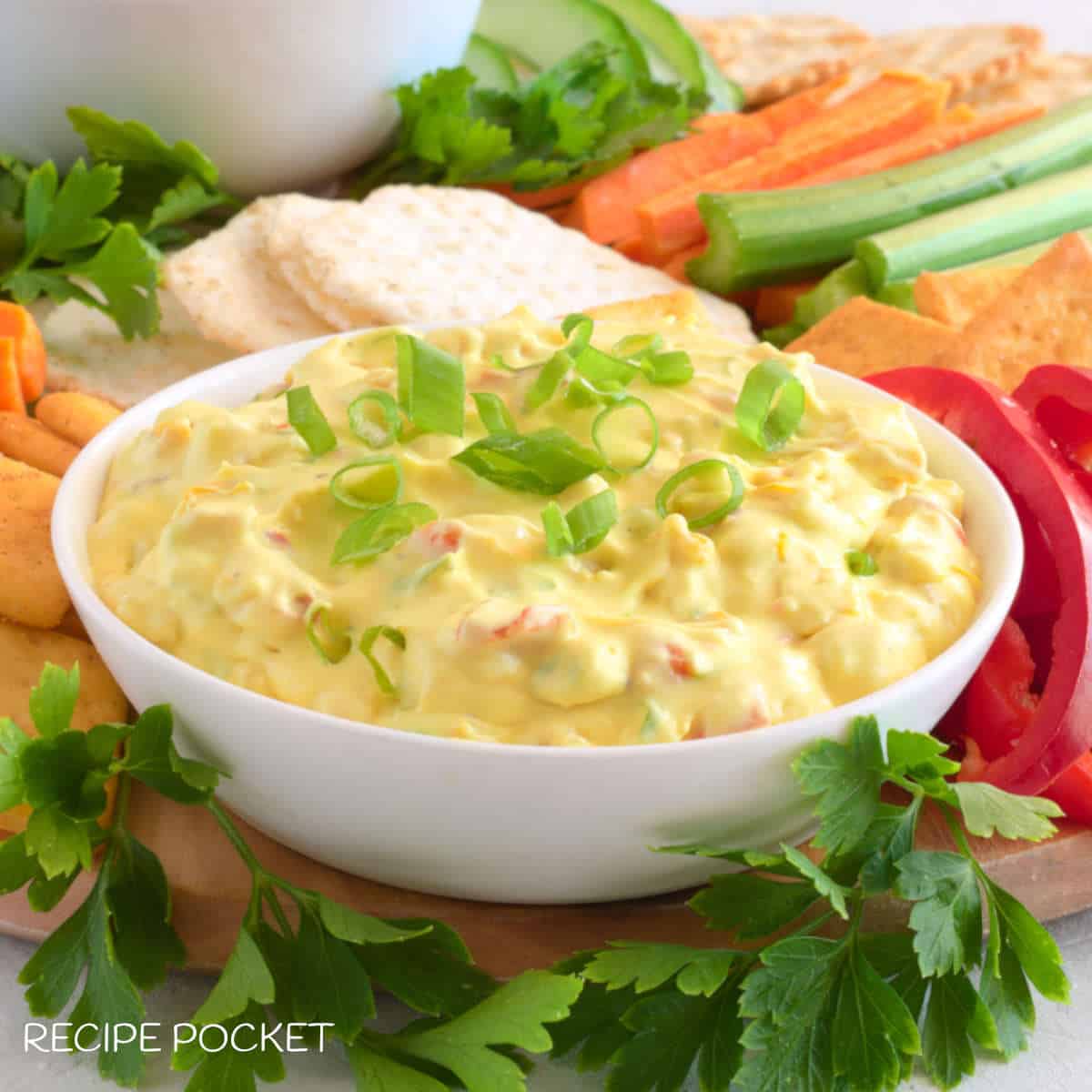 A white bowl filled with corn relish dip.