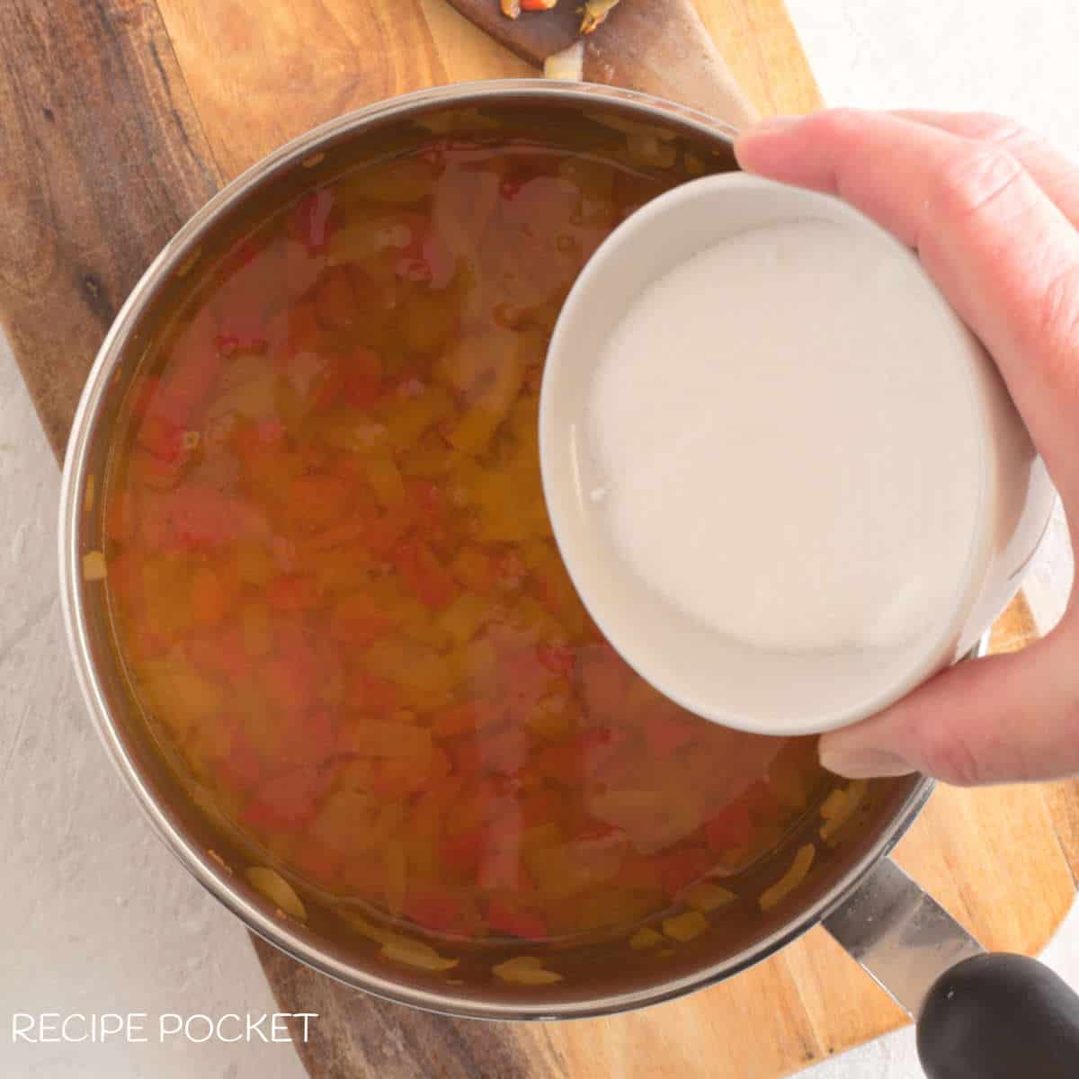 Vinegar and sugar in a saucepan.
