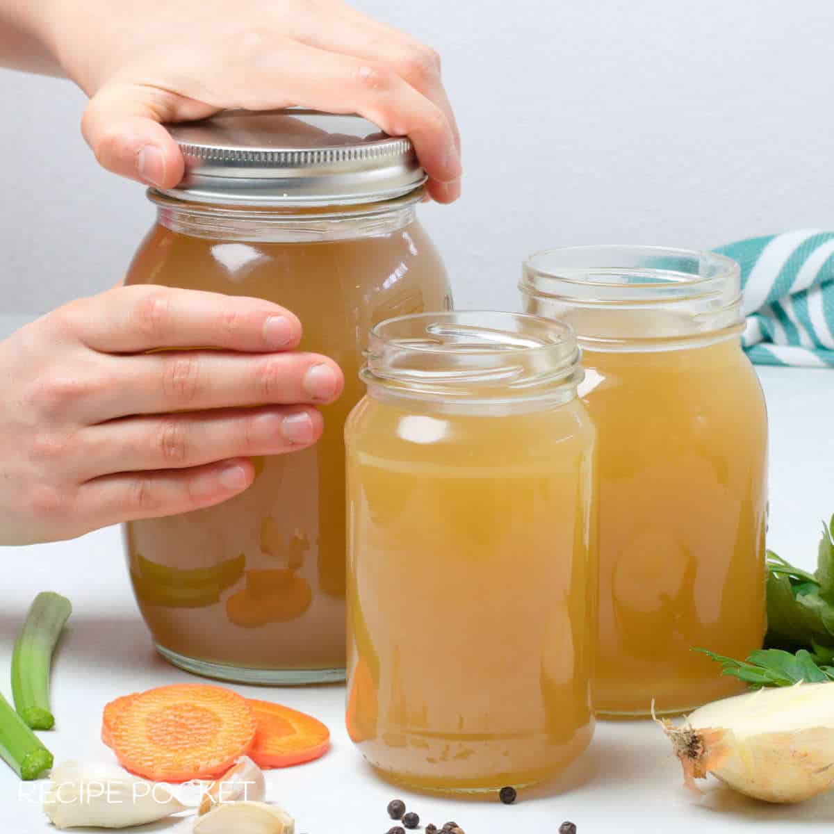 Gelatinous bone broth in glass bottles.