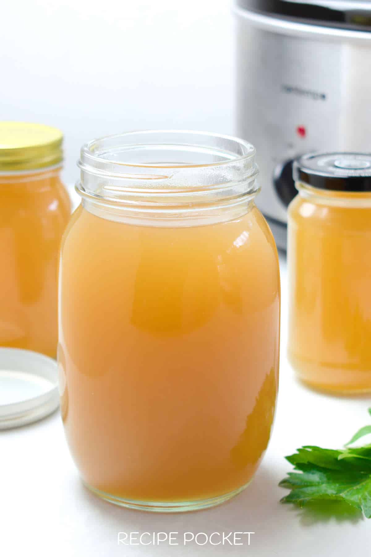 Homemade bone broth in jars.