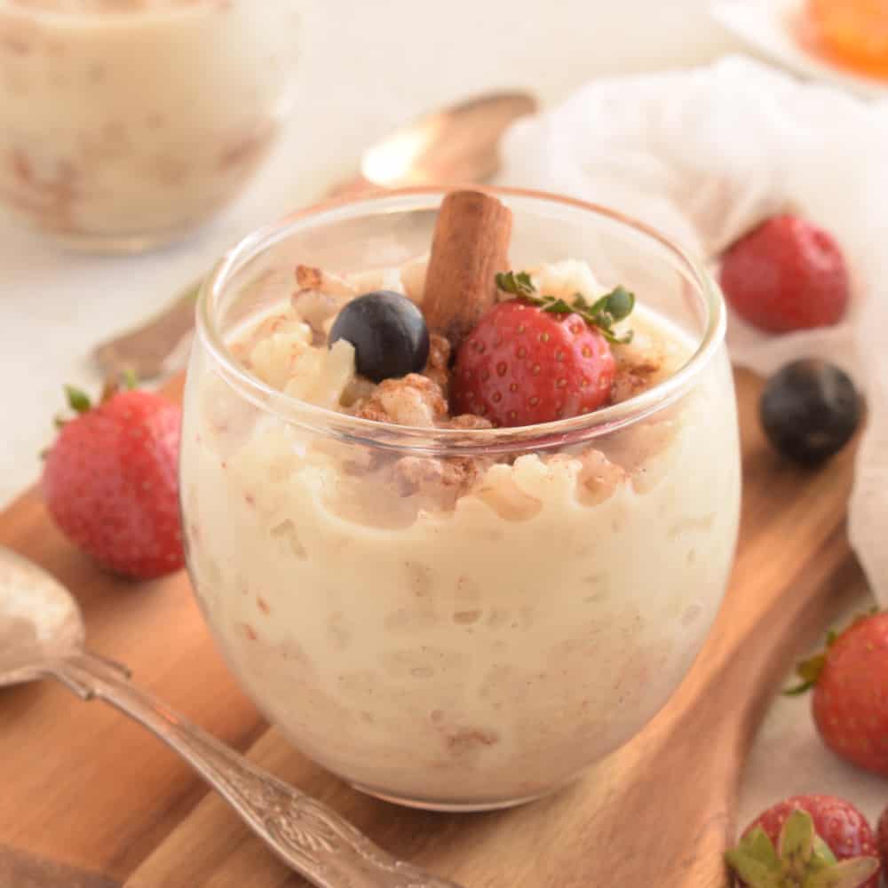 Rice pudding in a glass with strawberries.