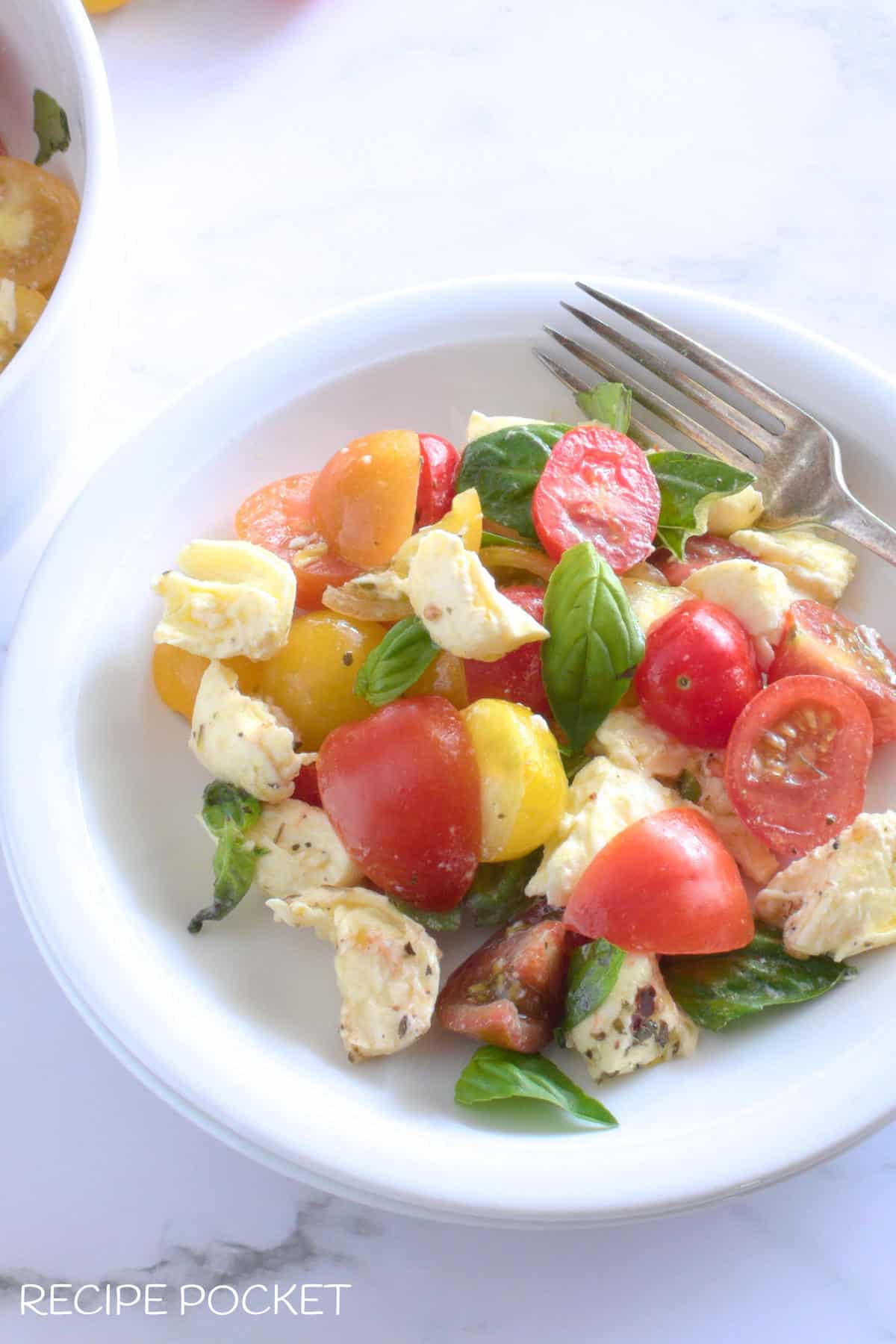 Tops down view of salad on a plate.