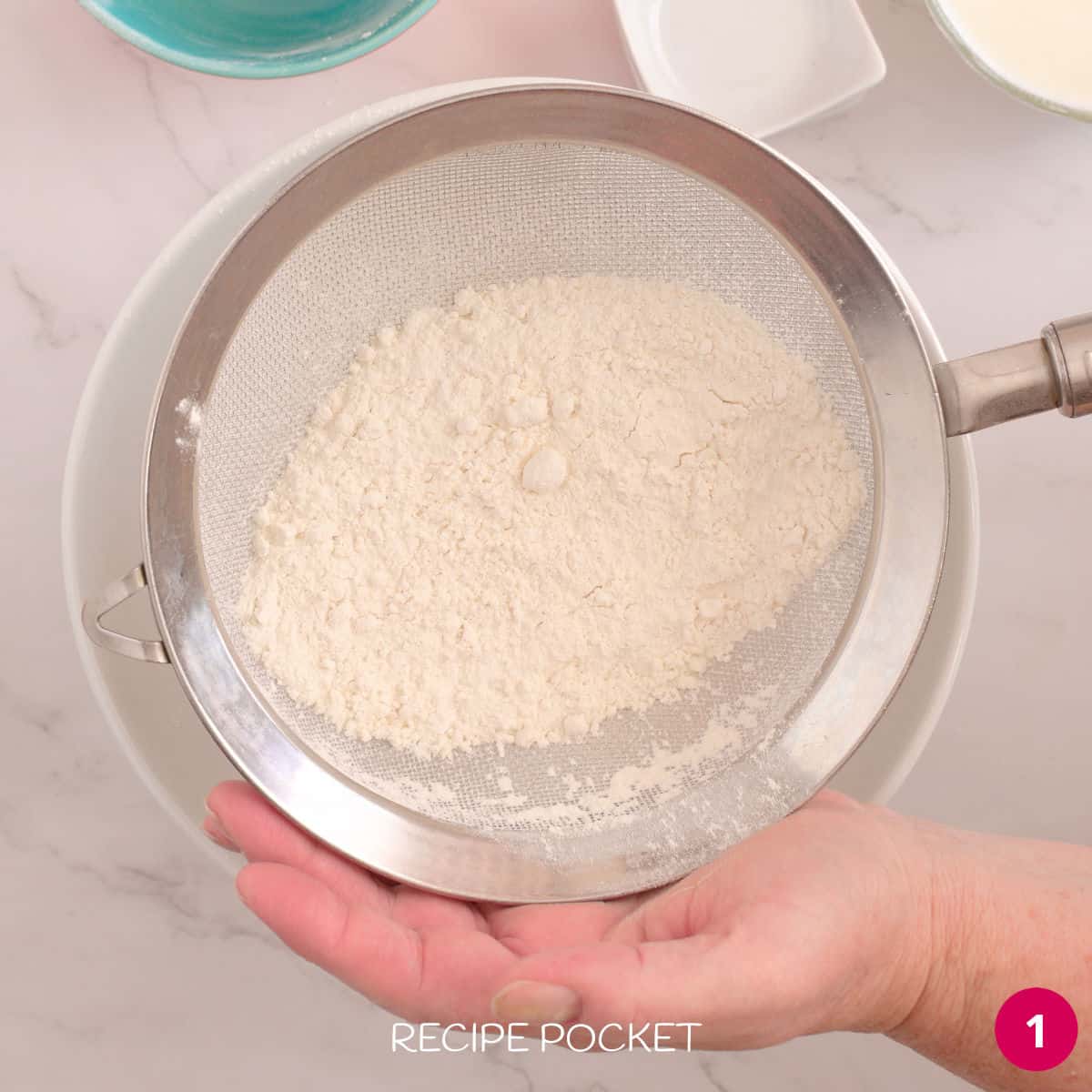 Sifting flour.