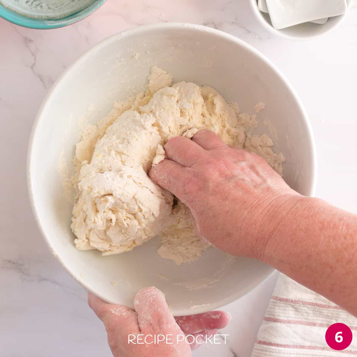 Kneading scone dough.