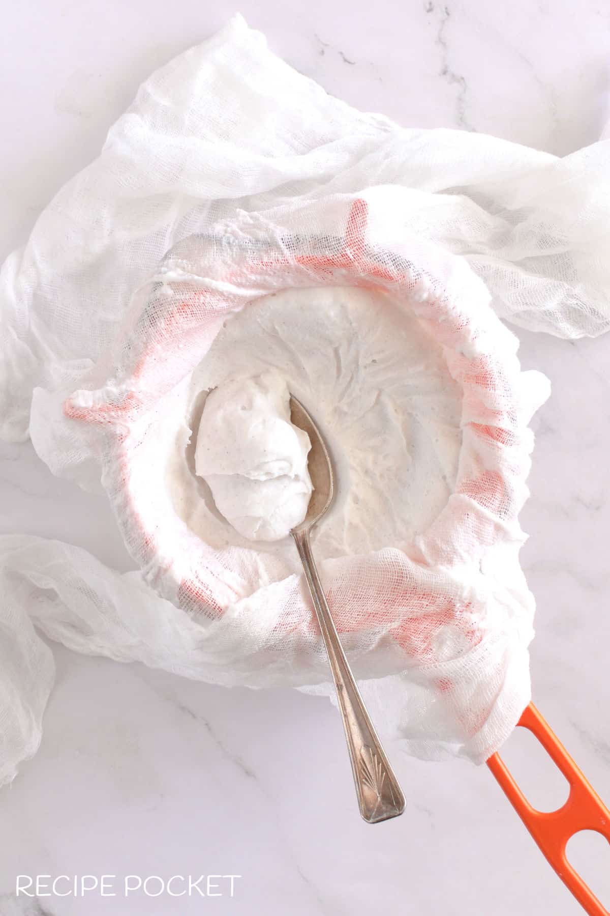 Image showing thick and creamy yogurt after 24 hours of draining.