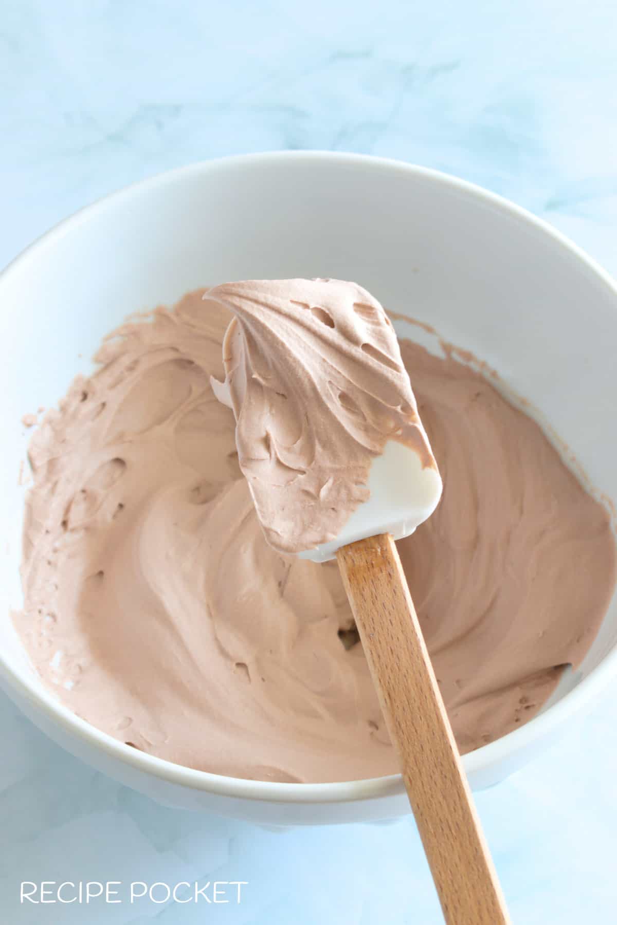 Whipped cream on a spatula.