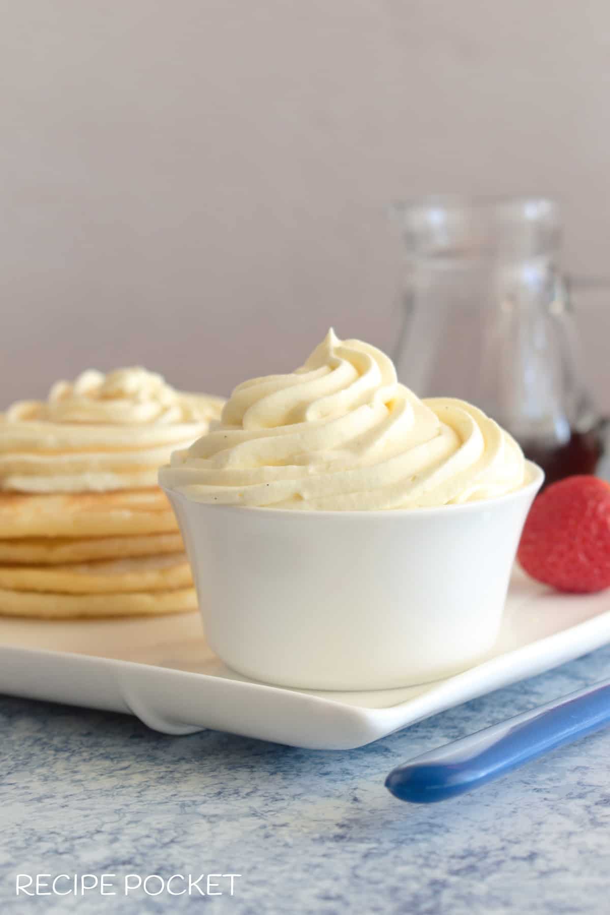 Close up of whipped cream in a bowl.
