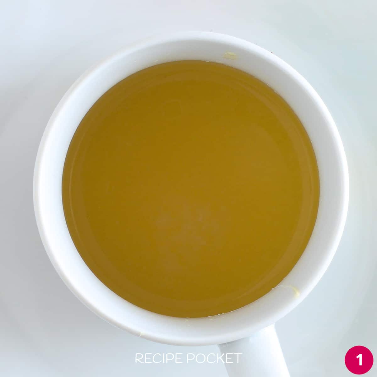 Melted butter in a mug.