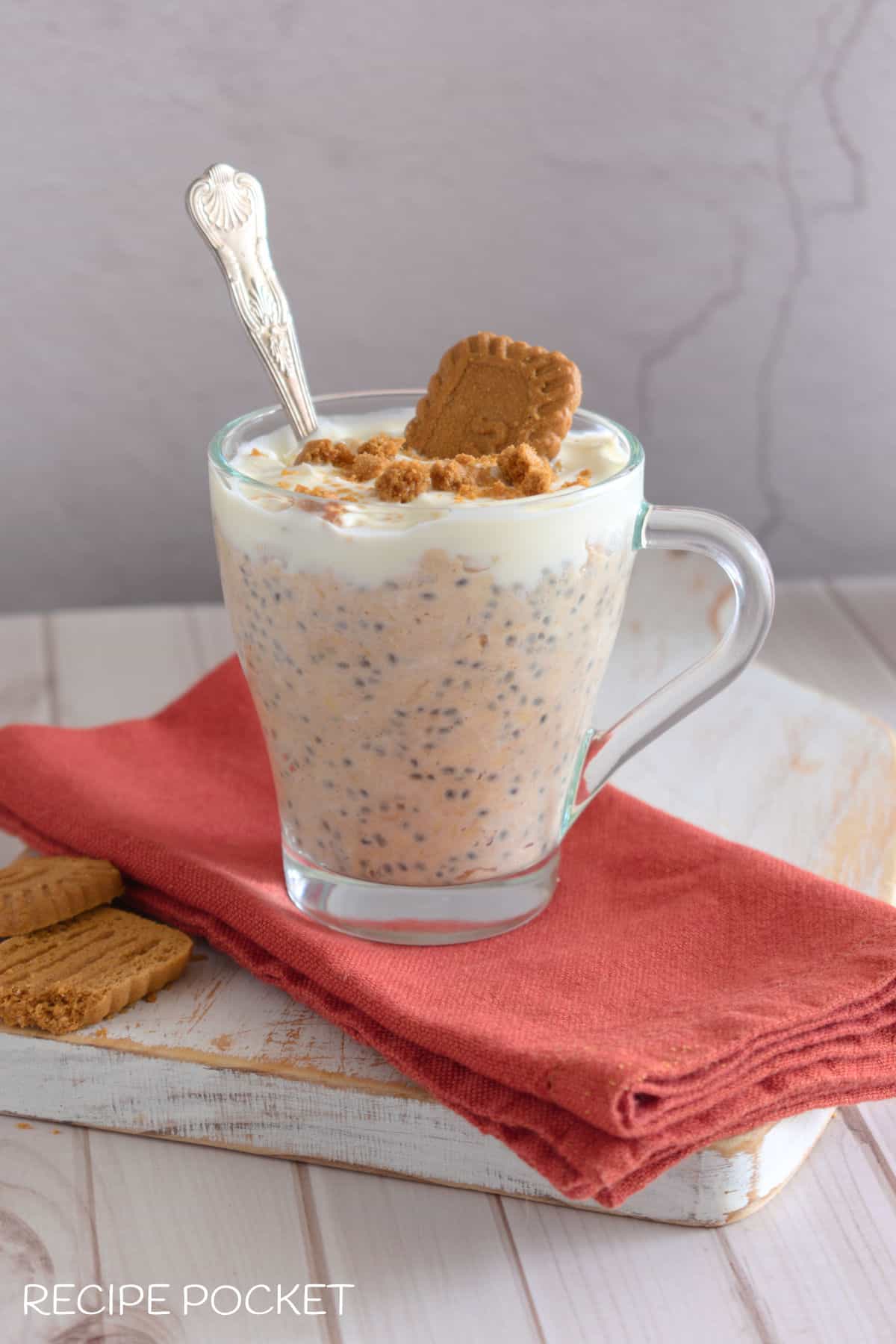 Biscoff oats with a spoon in it.