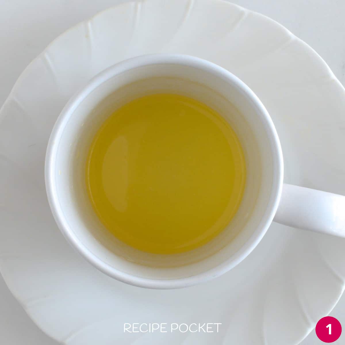 Melted butter in a mug.