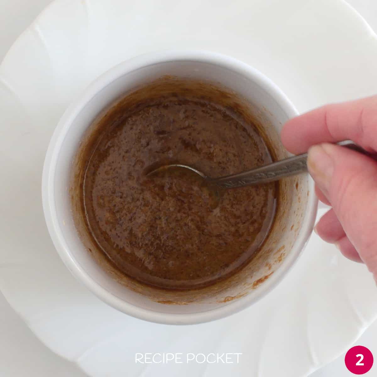 Cake batter in a mug.
