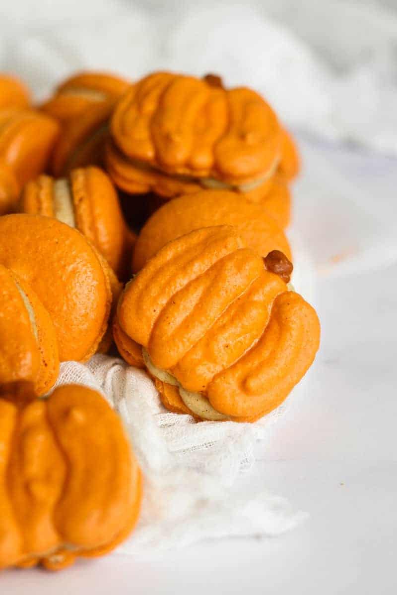 Pumpkin spice pumpkin shaped macarons.
