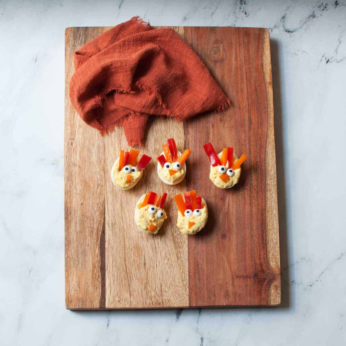 Thanksgiving deviled eggs made to look like turkeys.