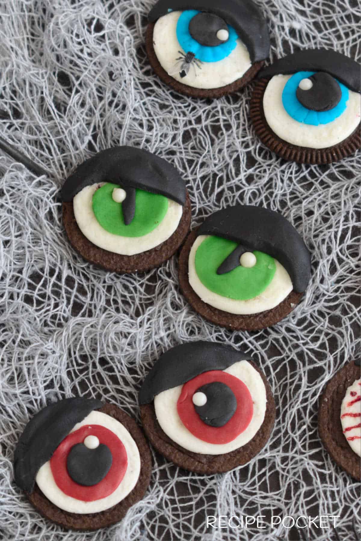 Green, blue and red oreo eyeball cookies.